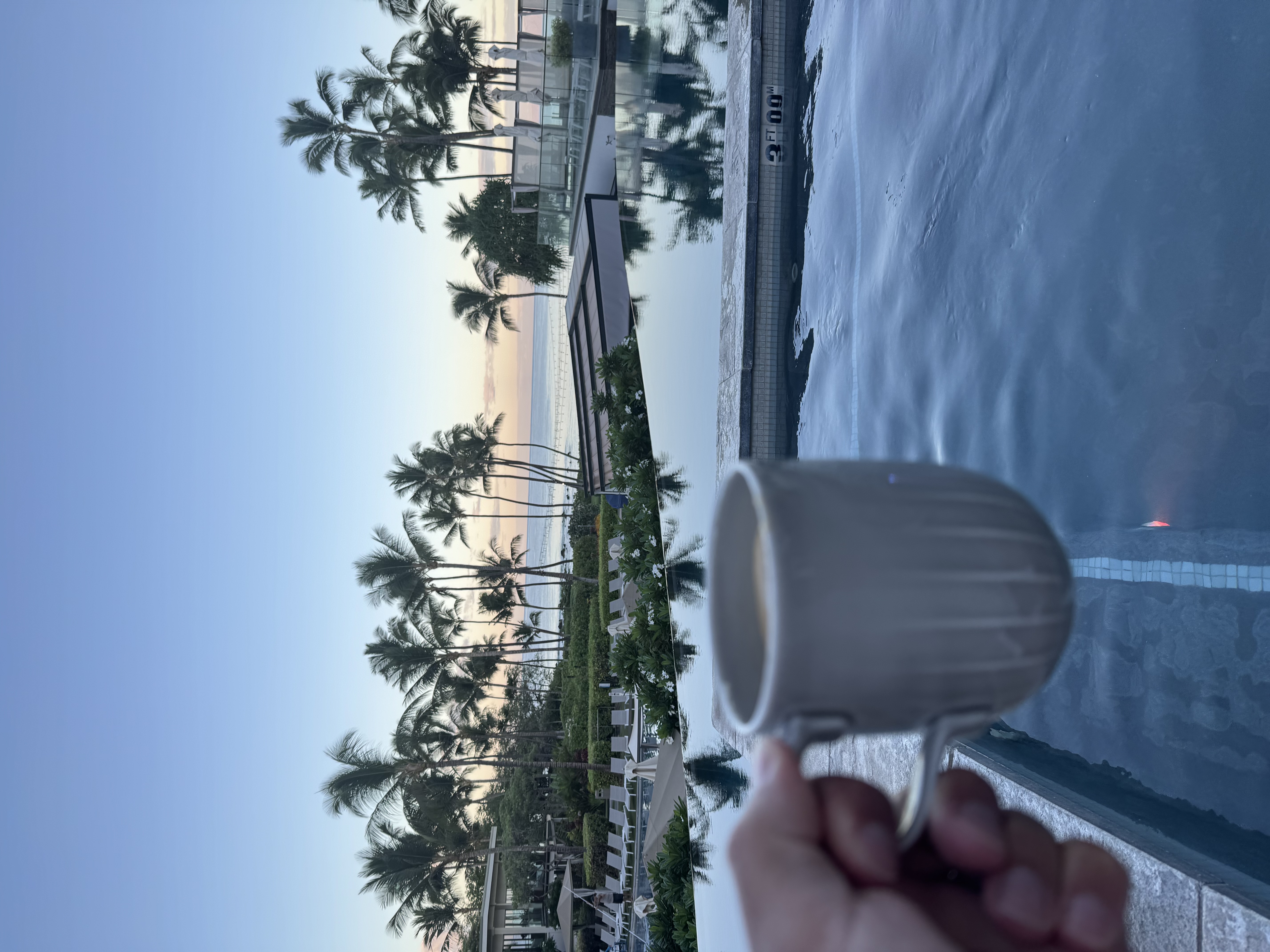 Morning coffee on the lanai at Andaz Maui with pool and ocean view